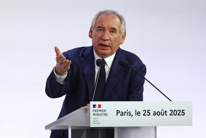 French Prime Minister François Bayrou gestures as he speaks during a press conference about his 2026 budget in Paris, France, August 25, 2025.