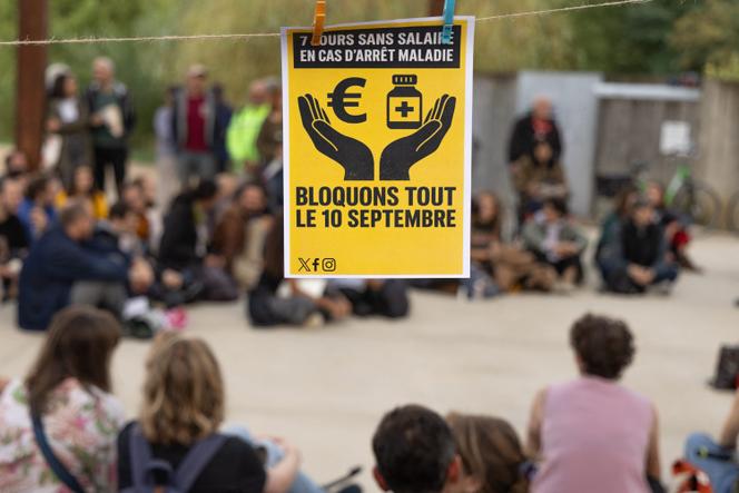At a general assembly of the Bloquons tout (Block Everything) movement at Îlot Tison in Poitiers, central France on September 1, 2025.