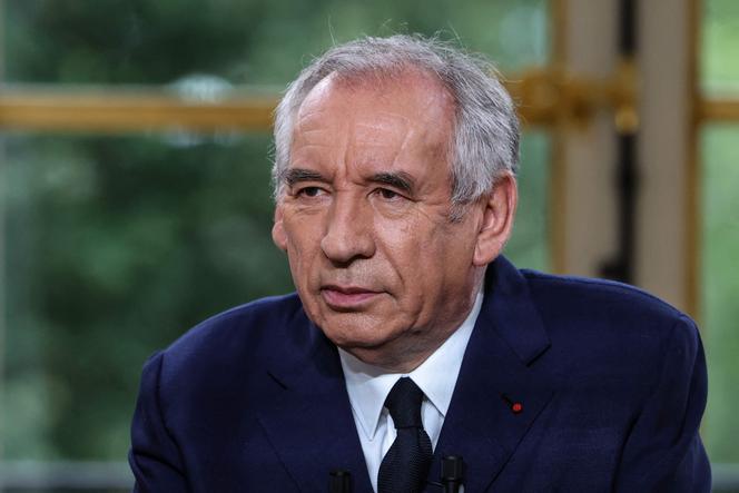 France's Prime Minister François Bayrou speaks with journalists during a live televised interview broadcast at the Hotel de Matignon in Paris, on August 31, 2025. 