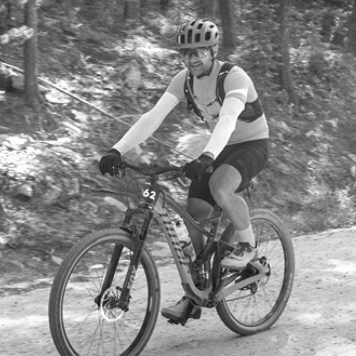 Chad Blakenship riding a mountain bike in the woods.