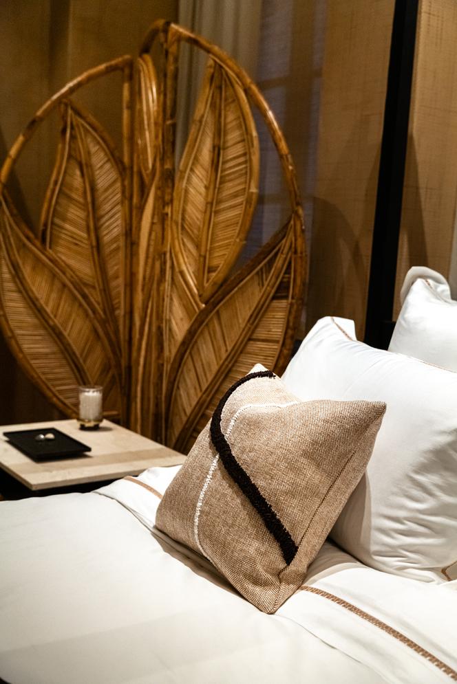 Cotton ribbon cushion, hand-embroidered by Hugo Falaise for Gilles & Boissier Home.