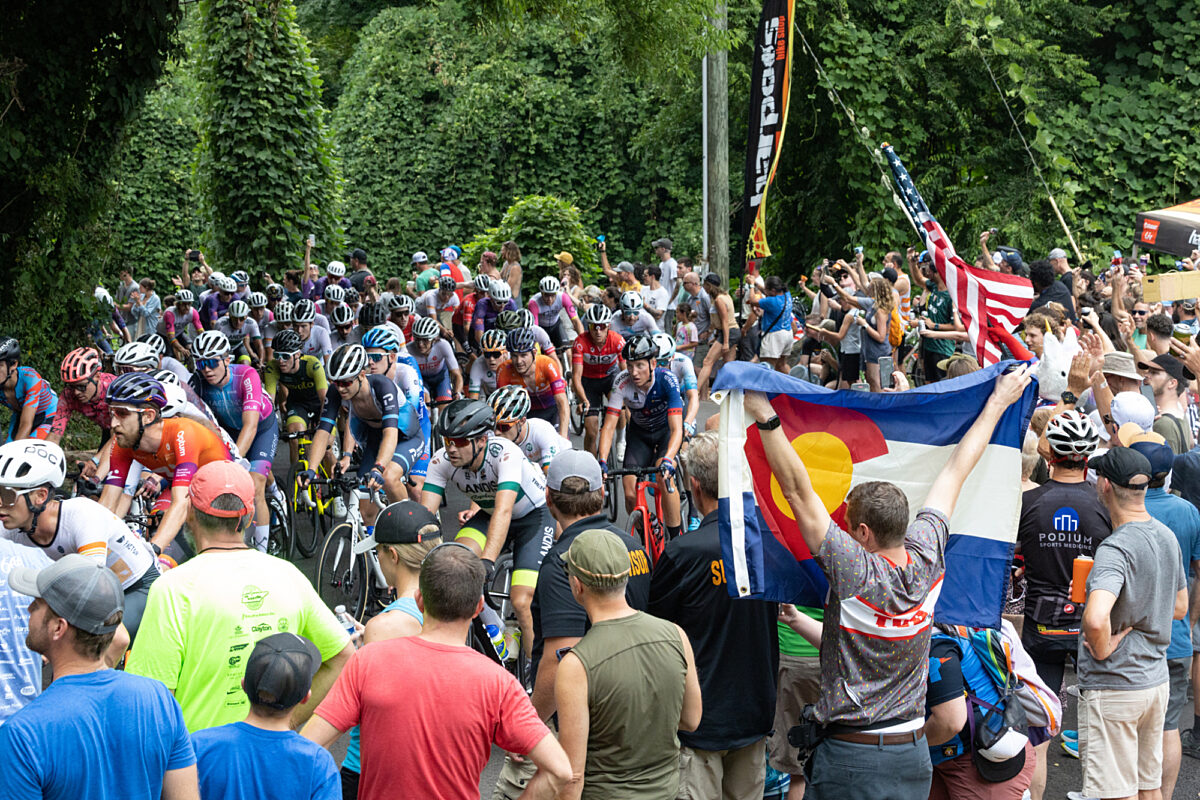 Fans cheering on a race.