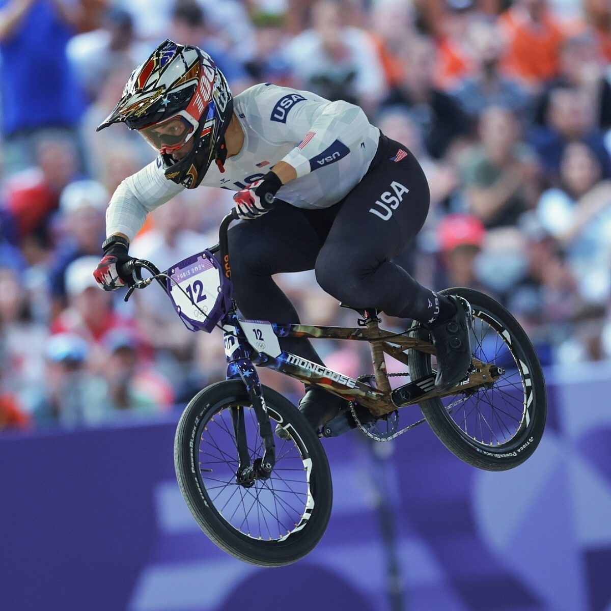 BMX rider midair at the Paris 2024 Olympics.
