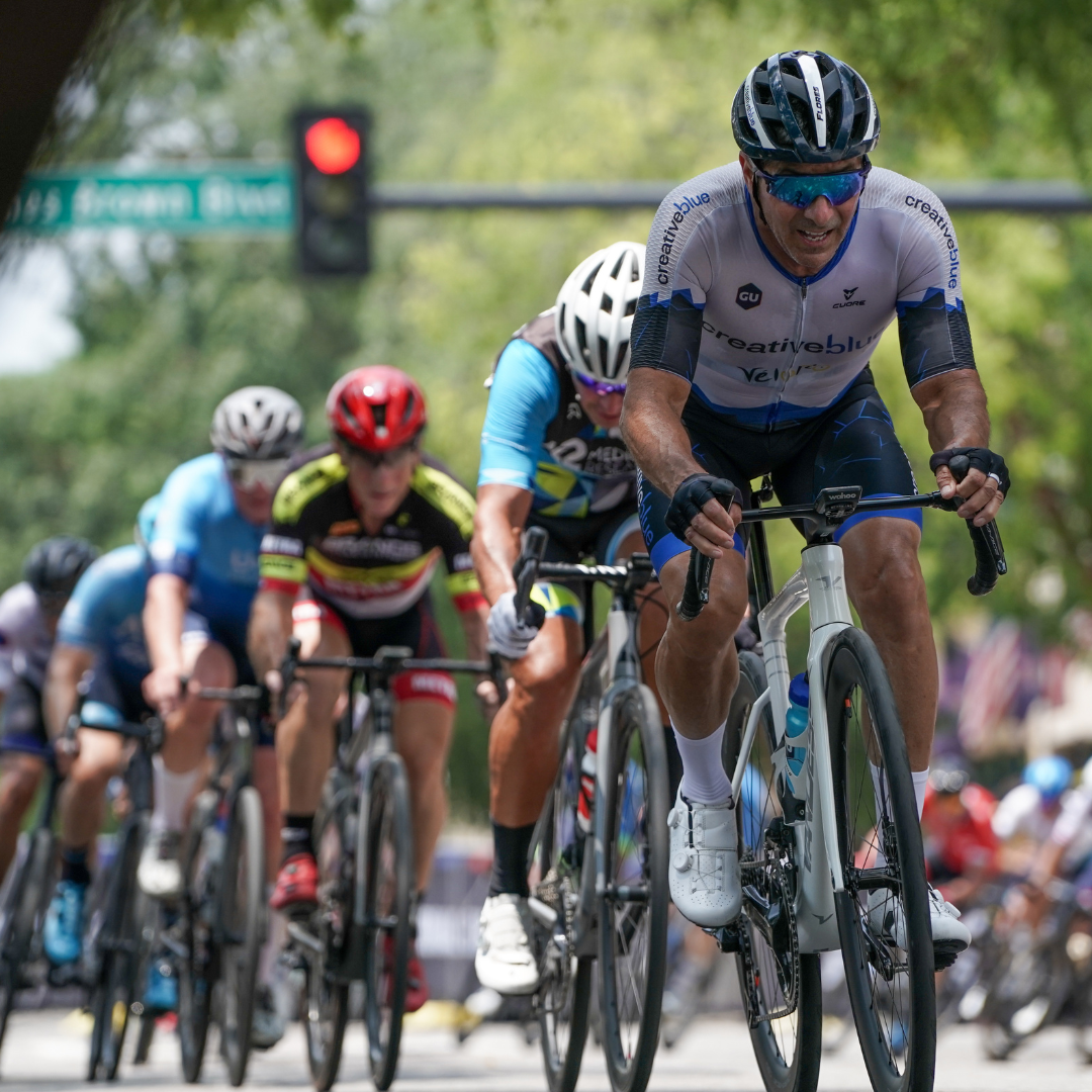 Road racer in front of other racers.